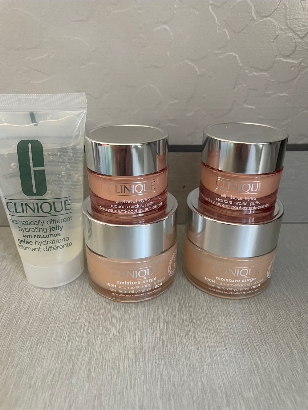 Clinique Moisturizers & Eye Cream 
1 oz moisture surge 100H, .5 oz. eye cream
